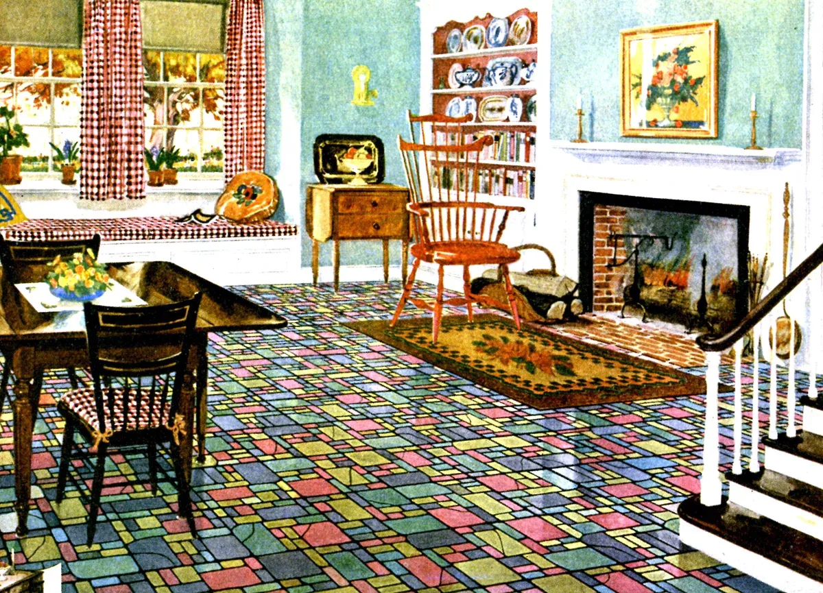 Ilustración de revista de 1928 de una sala con piso de linóleo multicolor, una alfombra trenzada, una chimenea y una mesa de comedor